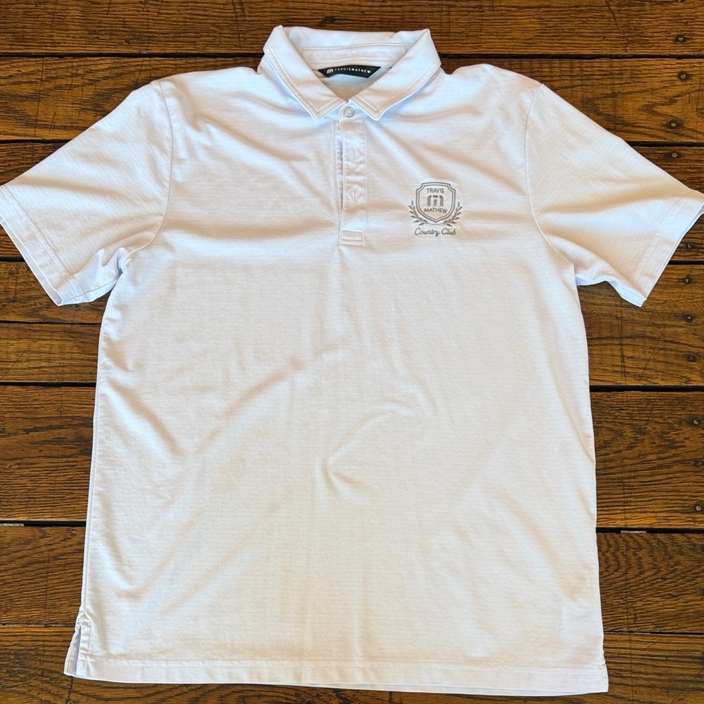 Travis Mathew White Short Sleeve Polo with Embroidered Crest
